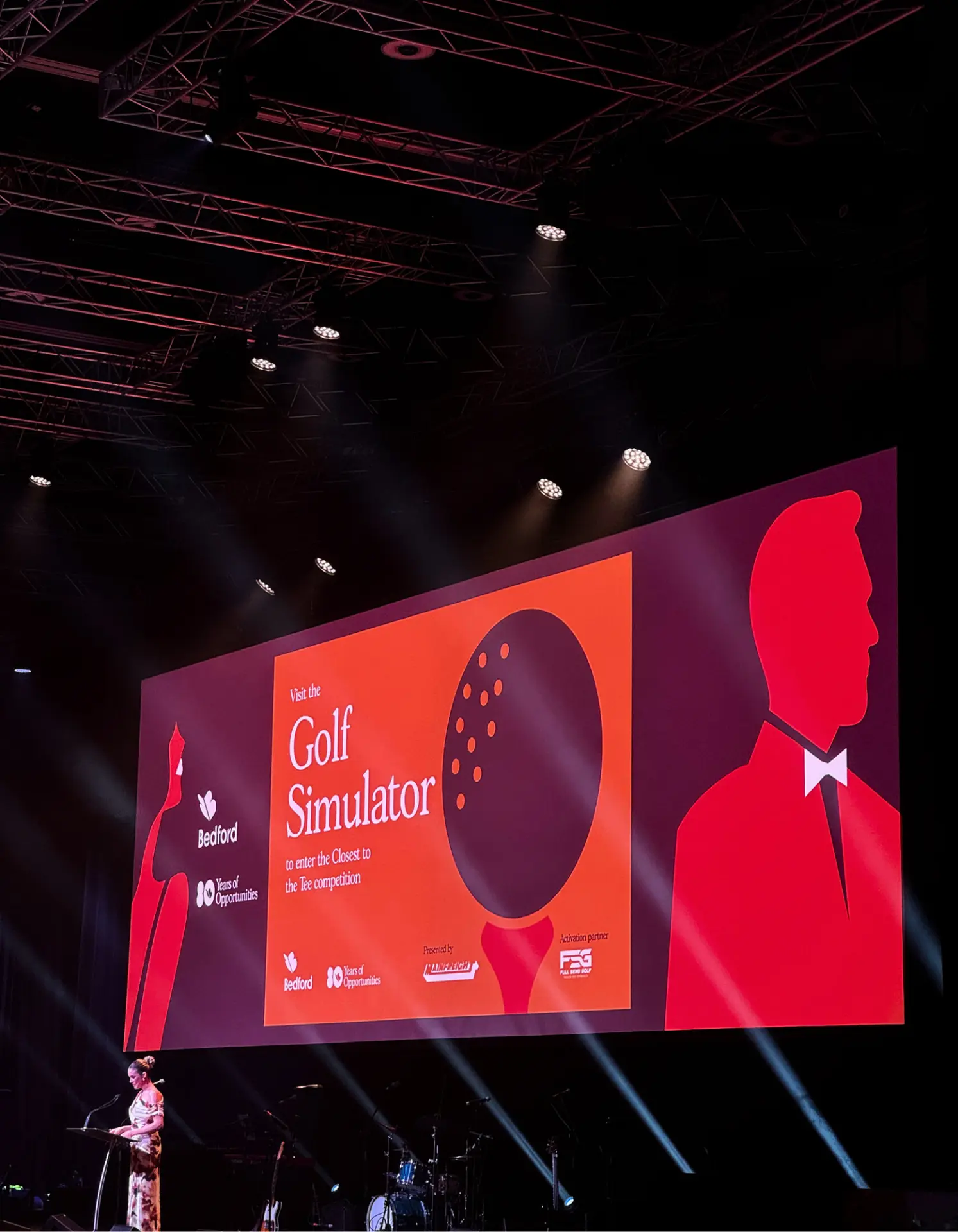 Closest to the Tee golf simulator competition announced on the big stage screen at a black-tie Adelaide gala